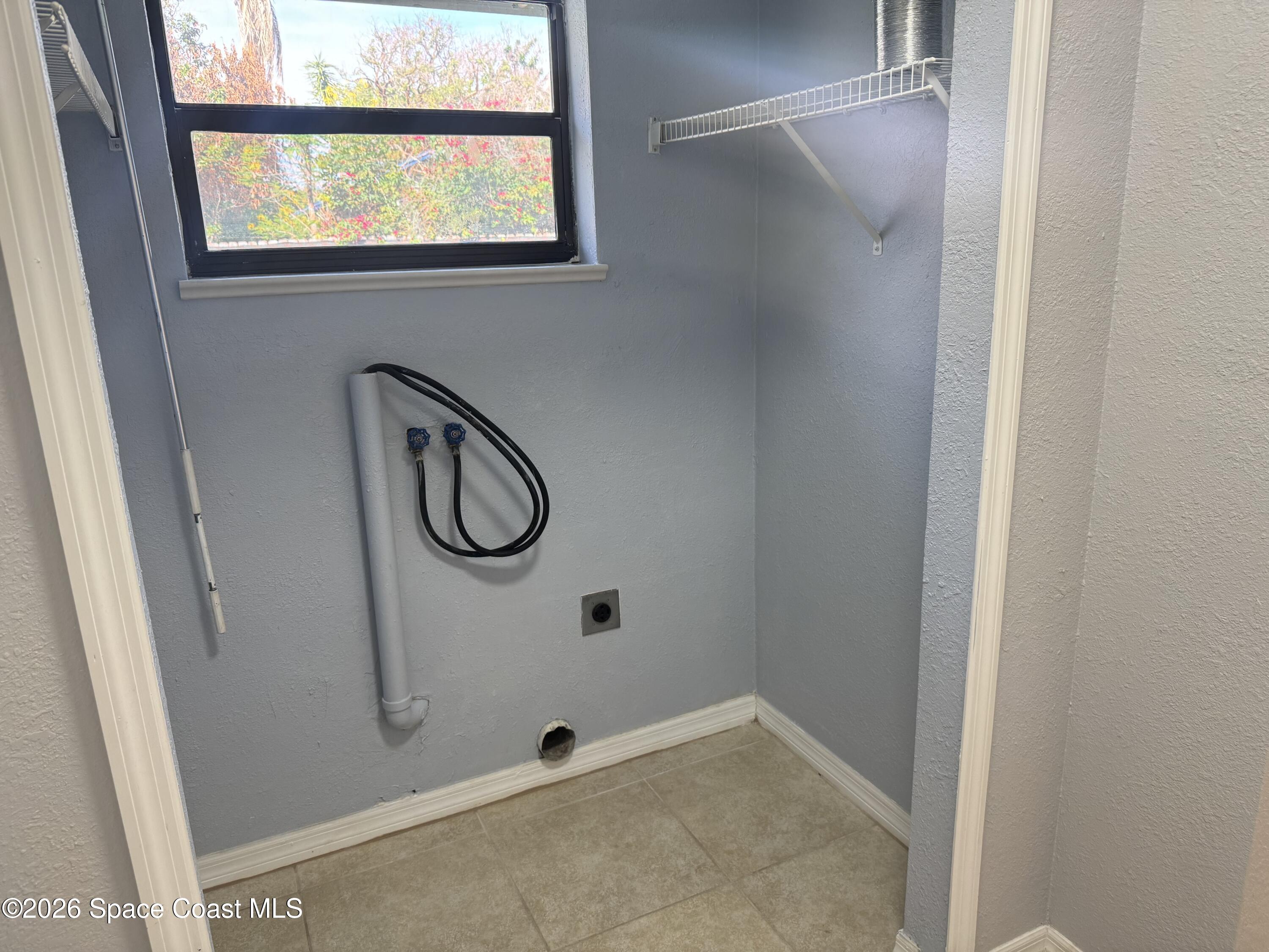 2135 South River Road Melbourne Beach, FL 32951 - Photo 4 of 14 a bathroom with a granite countertop shower and a sink