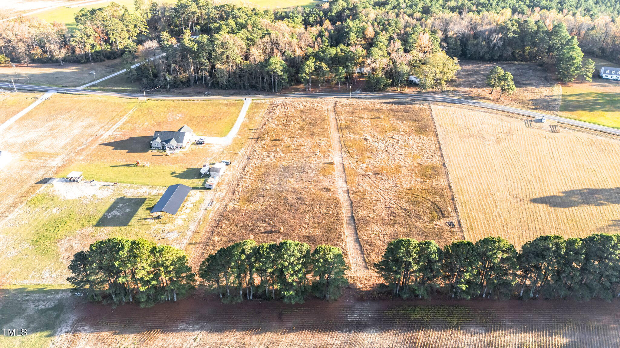 3030 Godwin Lake Road Benson, NC 27504 - Photo 12 of 18 a view of swimming pool with an outdoor space and seating area