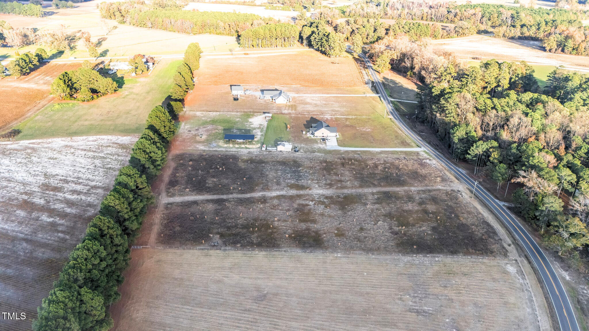 3030 Godwin Lake Road Benson, NC 27504 - Photo 13 of 18 a view of a pathway both side of building