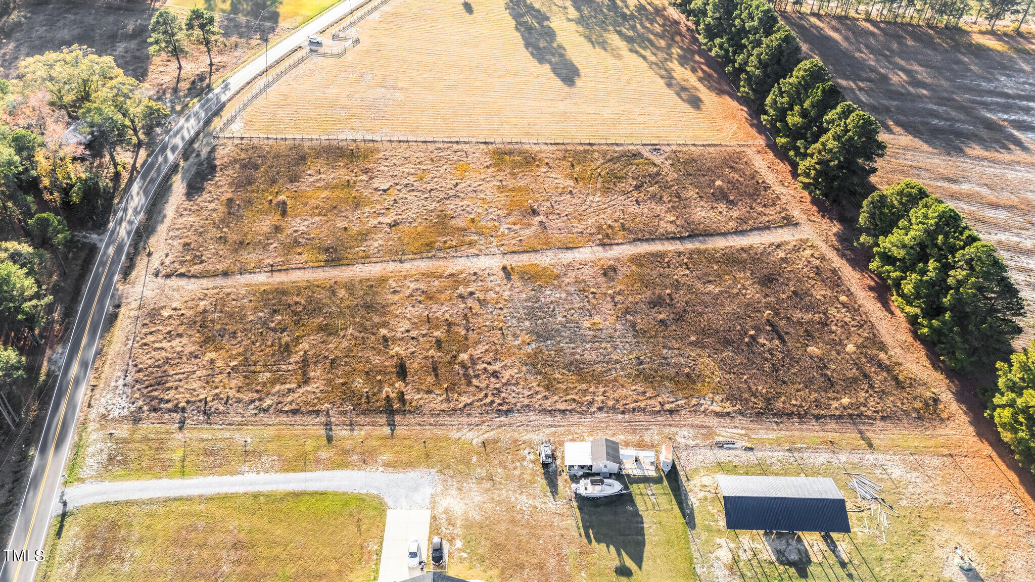3030 Godwin Lake Road Benson, NC 27504 - Photo 15 of 18 a view of a large building