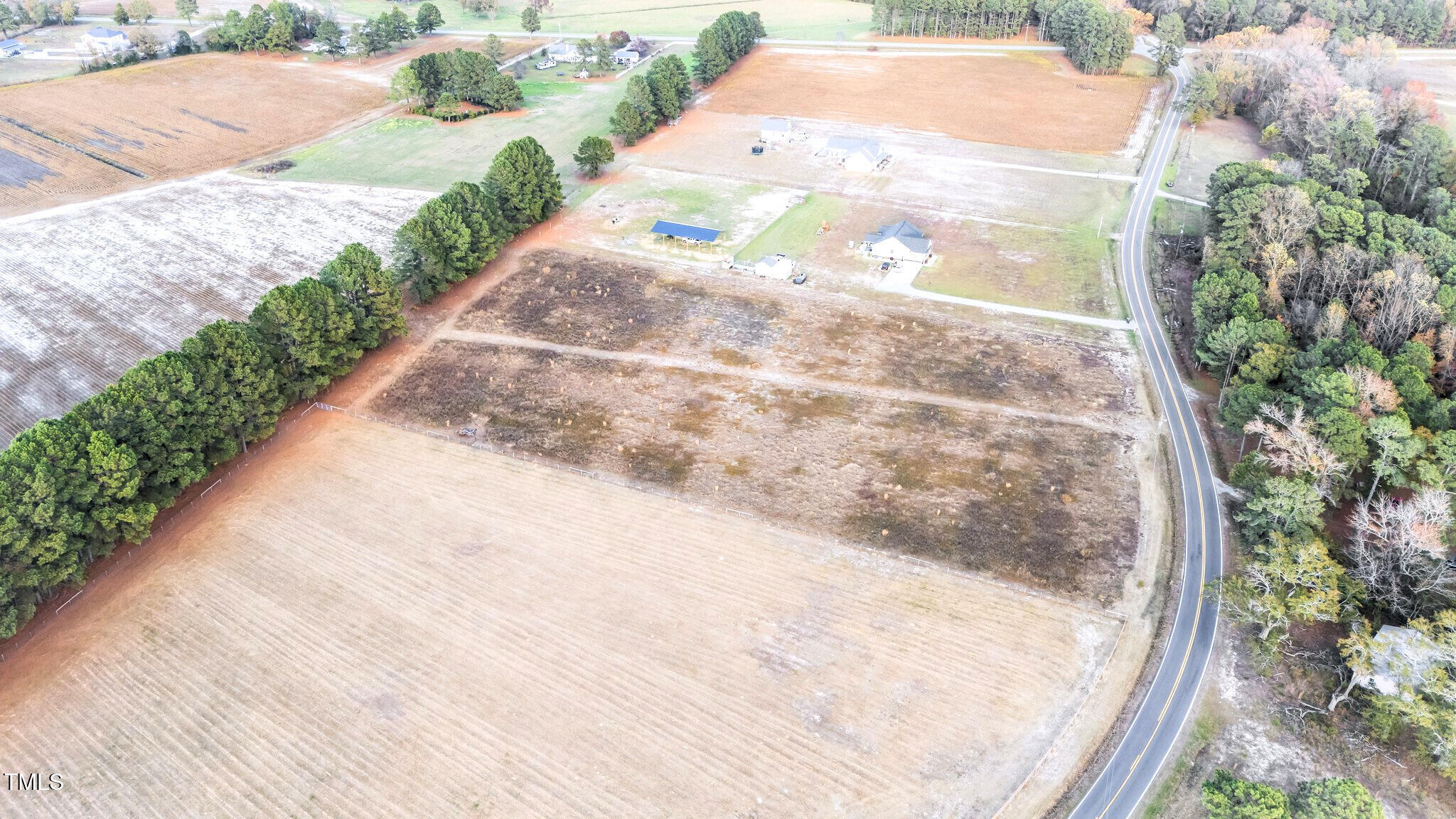 3030 Godwin Lake Road Benson, NC 27504 - Photo 16 of 18 a view of a backyard of the house