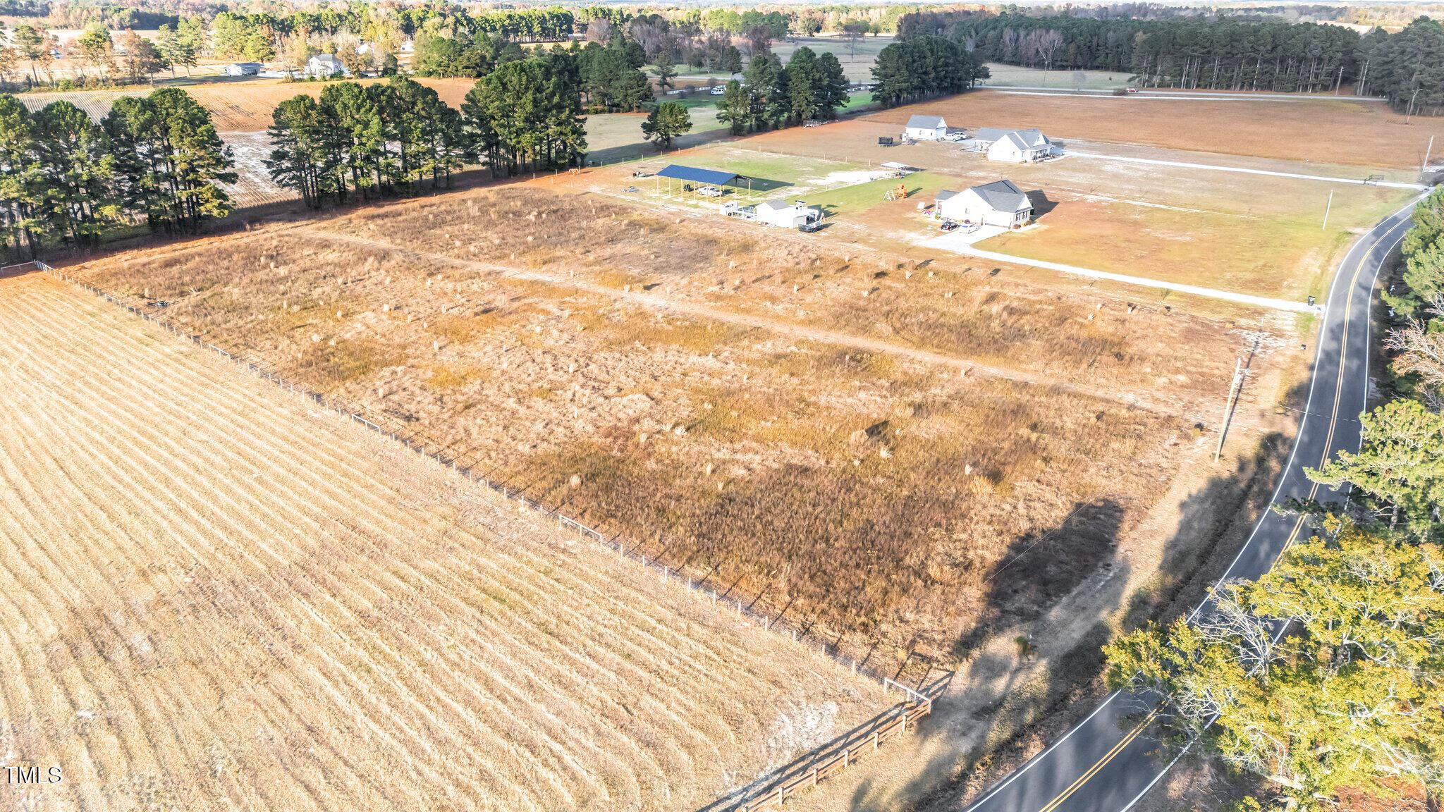3030 Godwin Lake Road Benson, NC 27504 - Photo 17 of 18 a view of a swimming pool with an outdoor space
