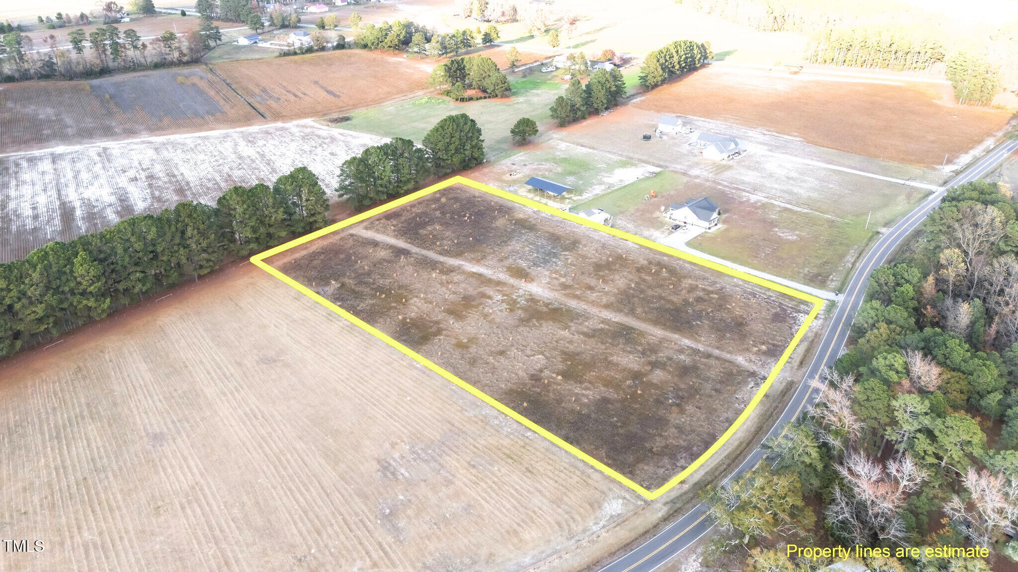 3030 Godwin Lake Road Benson, NC 27504 - Photo 4 of 18 a view of a backyard