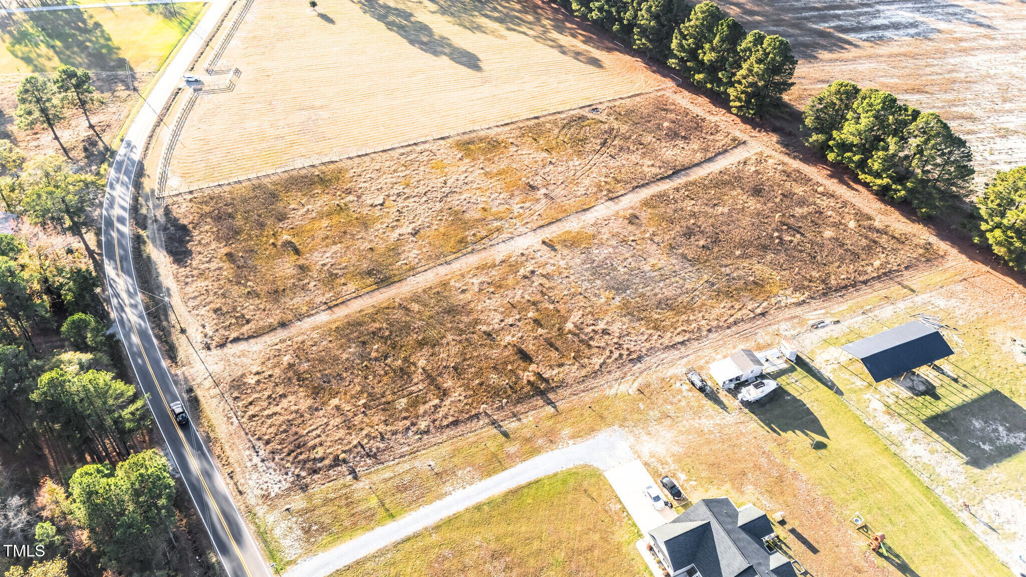 3030 Godwin Lake Road Benson, NC 27504 - Photo 7 of 18 a view of balcony with wooden floor