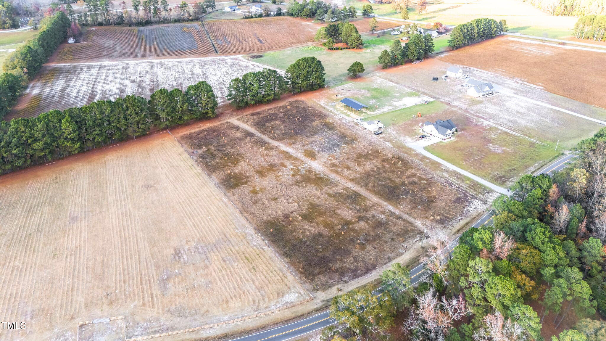 3030 Godwin Lake Road Benson, NC 27504 - Photo 9 of 18 a view of a backyard