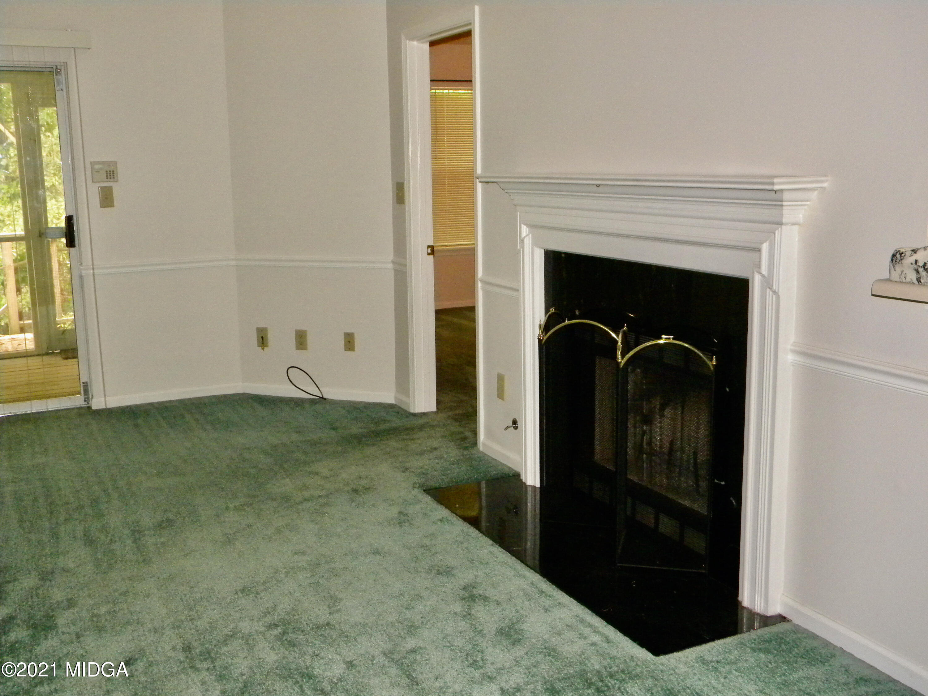 918 Ridge Crest Court Macon, GA 31204 - Photo 3 of 9 3-Den and fireplace looking to master BR