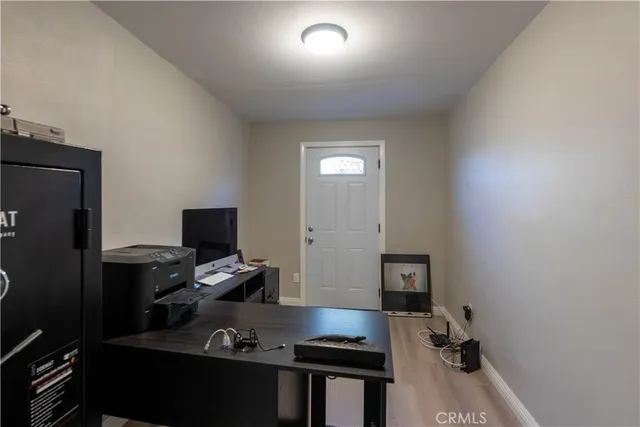 a workspace with furniture and lamp