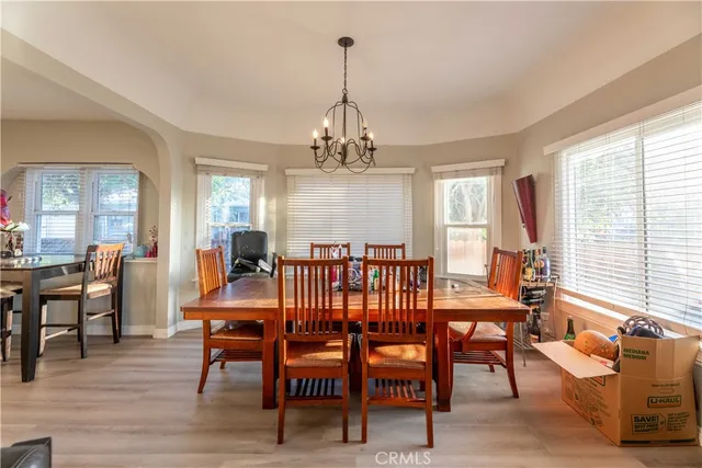a view of a dining room with furniture window and outside view