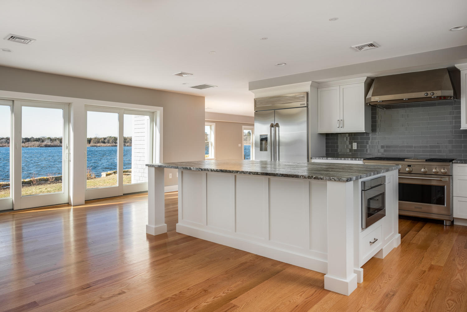 333 Mill Road Falmouth, MA 02540 - Photo 21 of 68 a kitchen with stainless steel appliances granite countertop a stove a sink and a refrigerator