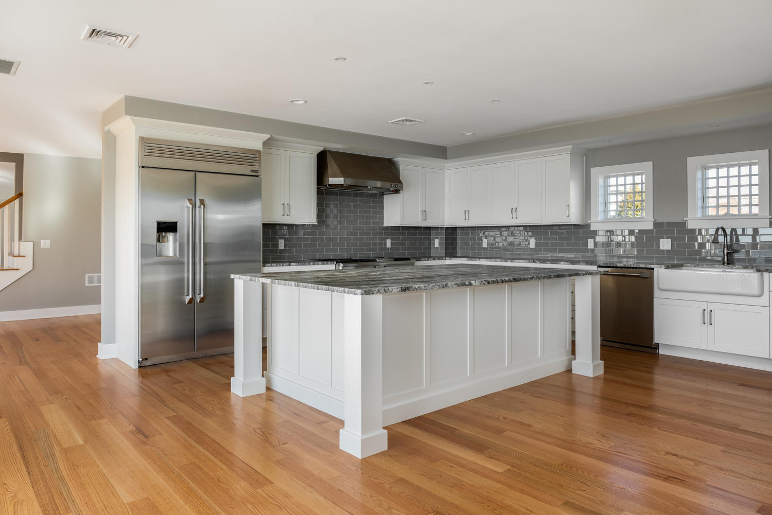 333 Mill Road Falmouth, MA 02540 - Photo 25 of 68 a kitchen with stainless steel appliances granite countertop a sink and cabinets