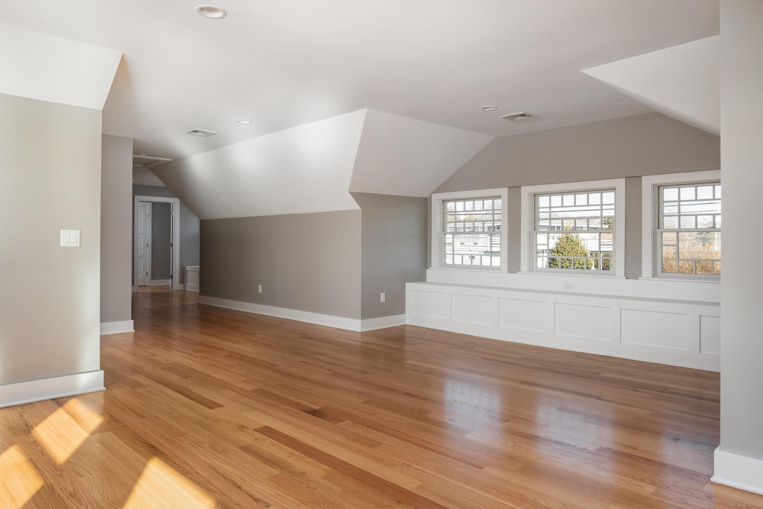 333 Mill Road Falmouth, MA 02540 - Photo 37 of 68 a view of an empty room with wooden floor and a window