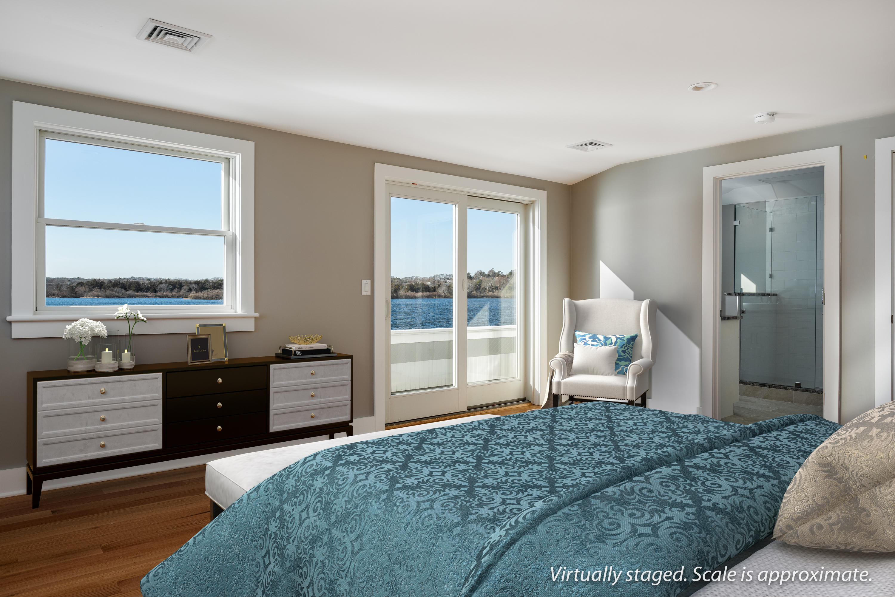 333 Mill Road Falmouth, MA 02540 - Photo 41 of 68 a bedroom with a bed and wooden floor