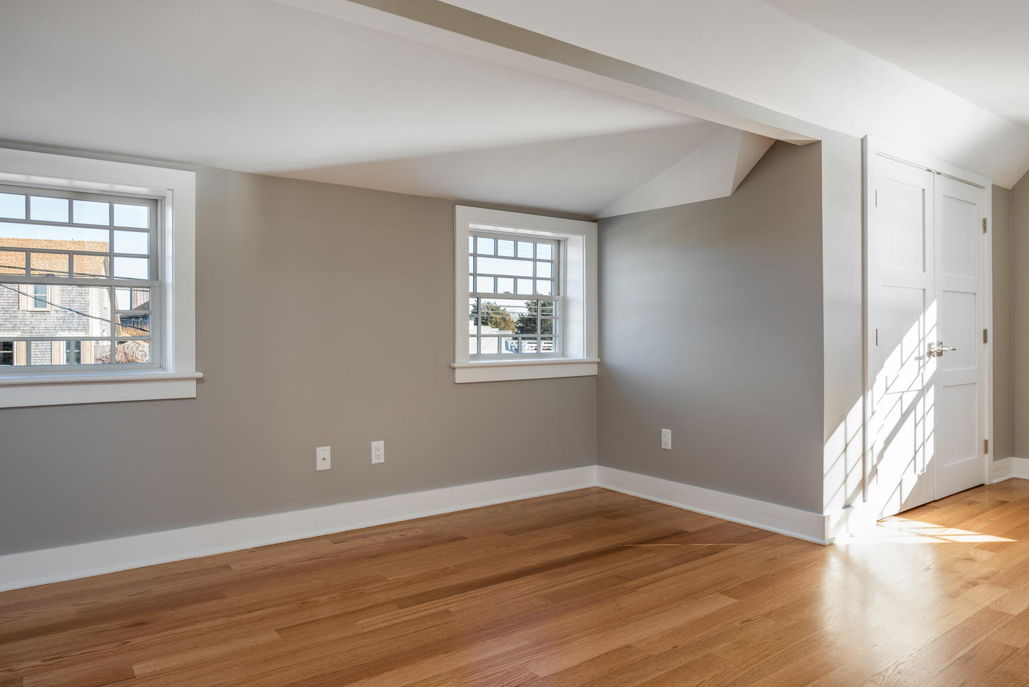 333 Mill Road Falmouth, MA 02540 - Photo 42 of 68 a view of an empty room with wooden floor and a window