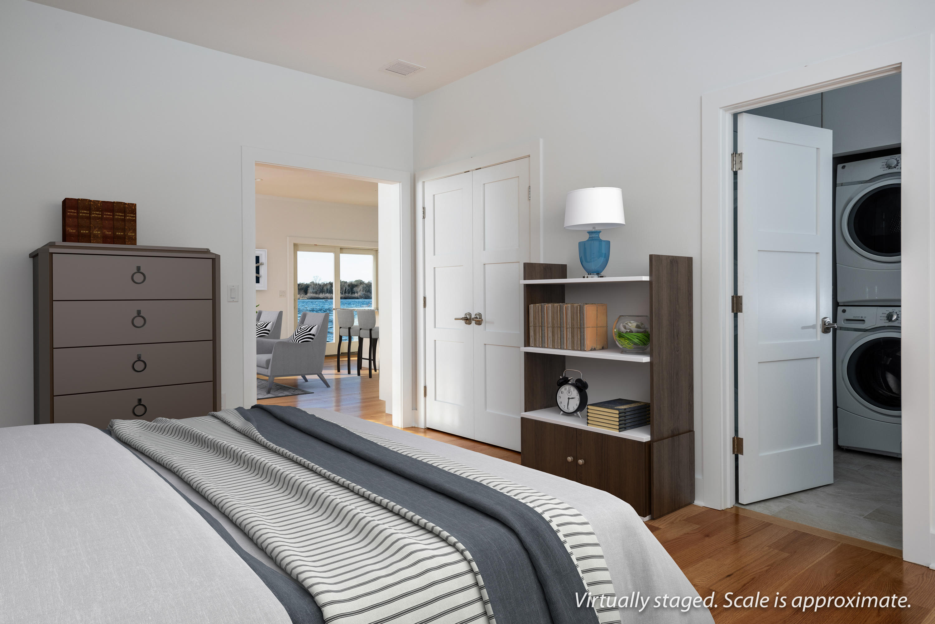 333 Mill Road Falmouth, MA 02540 - Photo 48 of 68 a bedroom with a bed and a view of kitchen