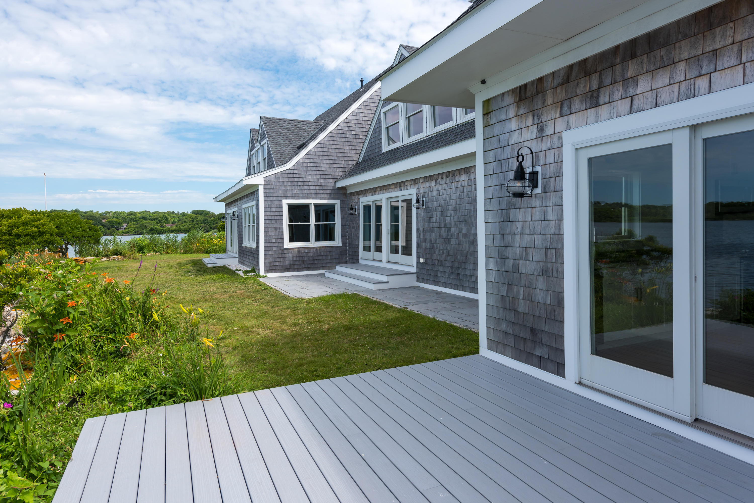 333 Mill Road Falmouth, MA 02540 - Photo 56 of 68 a view of a house with backyard and garden