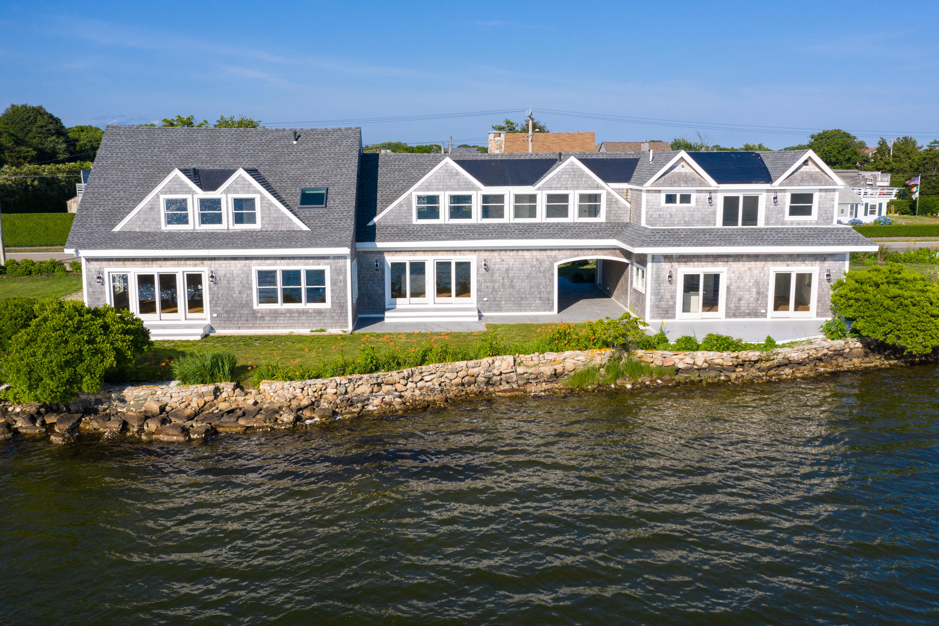 333 Mill Road Falmouth, MA 02540 - Photo 63 of 68 a front view of a house with swimming pool