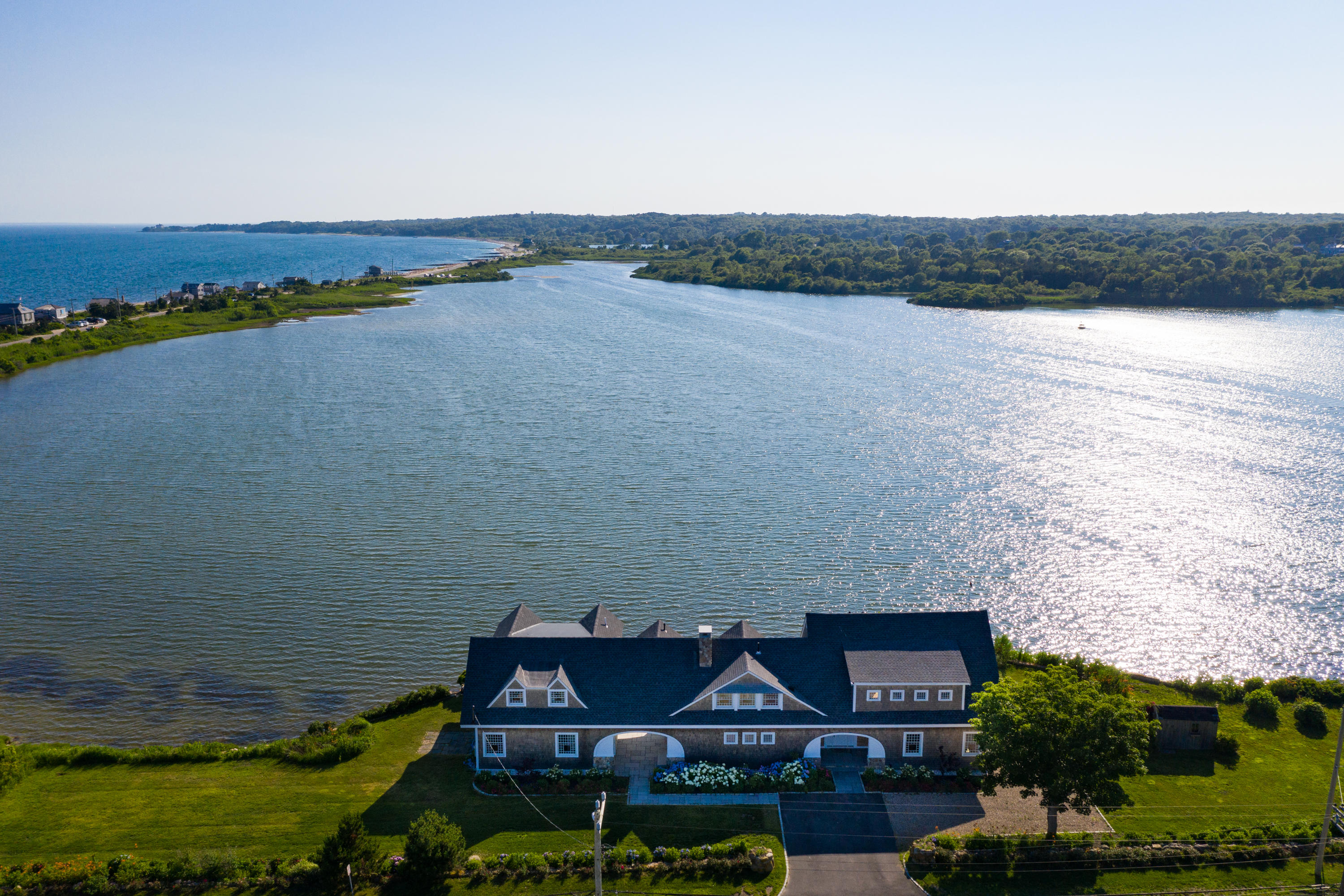 333 Mill Road Falmouth, MA 02540 - Photo 8 of 68 a view of a lake with a mountain in the background