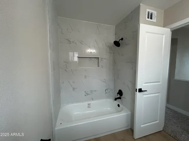 a bathroom with a bathtub