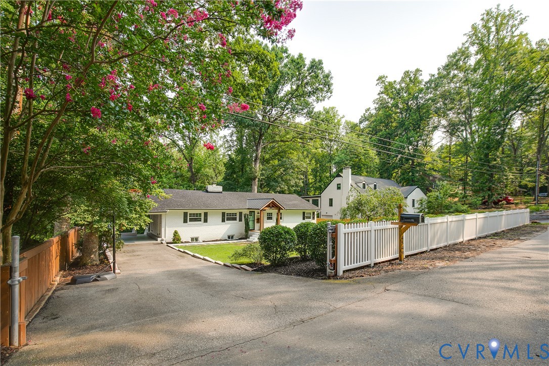 4549 Arrowhead Road Richmond, VA 23235 - Photo 2 of 75 The driveway widens at the entrance, allowing spac