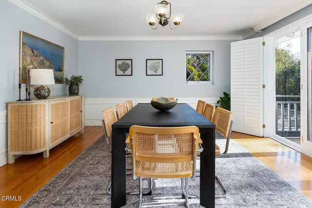 a kitchen with granite countertop wooden cabinets a sink and dishwasher