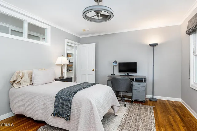 a view of a water fountain in front of a house