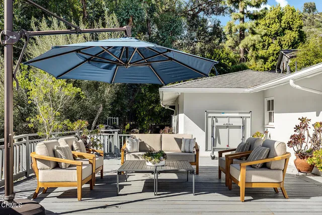 a view of a garden with an outdoor space