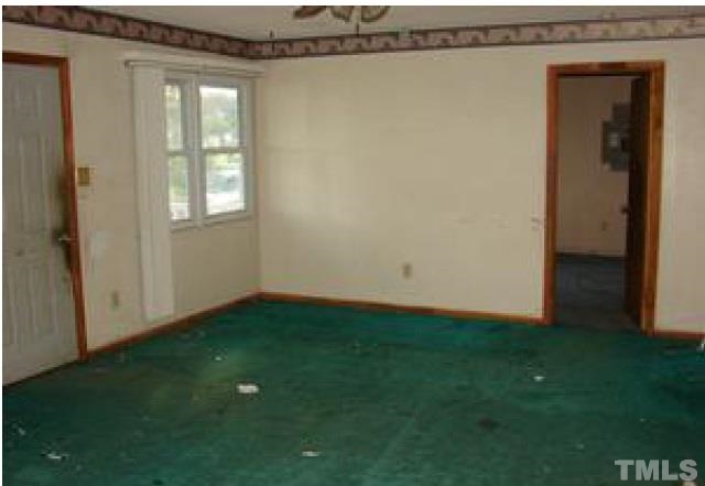 1535 Auctioneer Road Clinton, NC 28328 - Photo 5 of 10 a view of a room that has a window in it