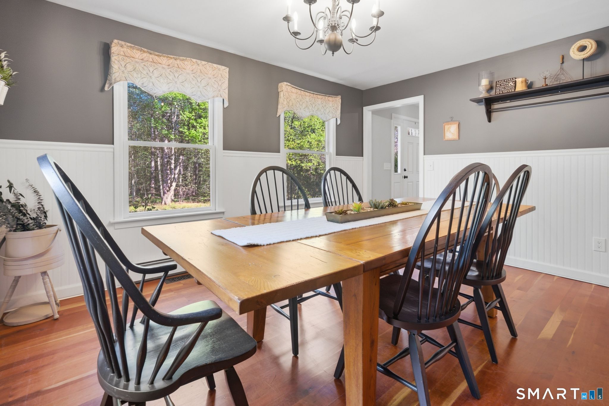 174 Walnut Hill Road Hartland, CT 06027 - Photo 6 of 36 a view of a dining room with furniture window and wooden floor