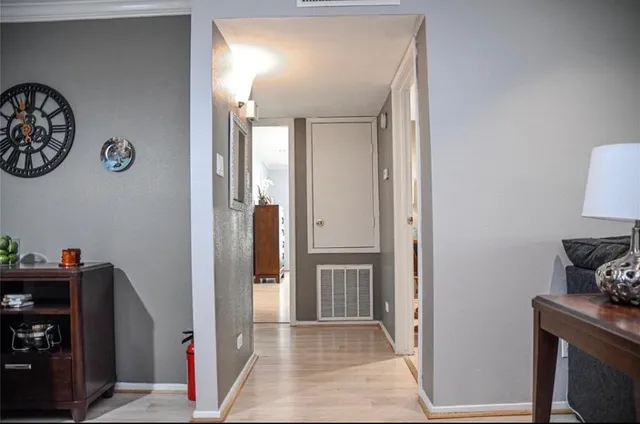 a view of a hallway with elevator