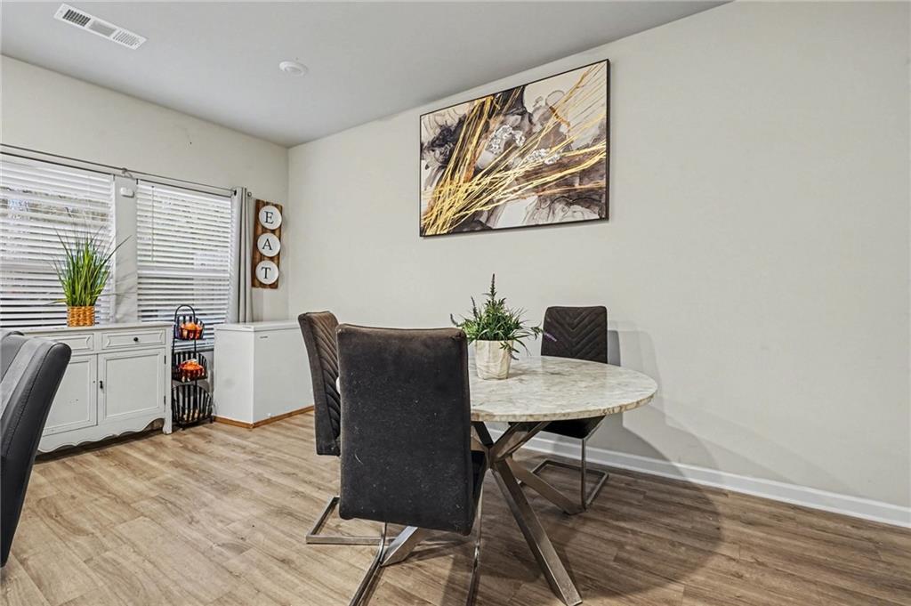 6182 Redan Overlook, Unit 97 Lithonia, GA 30058 - Photo 13 of 23 a workspace with furniture and window