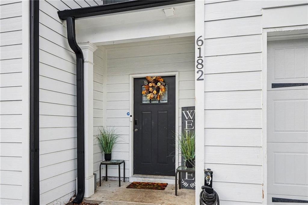 6182 Redan Overlook, Unit 97 Lithonia, GA 30058 - Photo 2 of 23 a sign on the door of a building