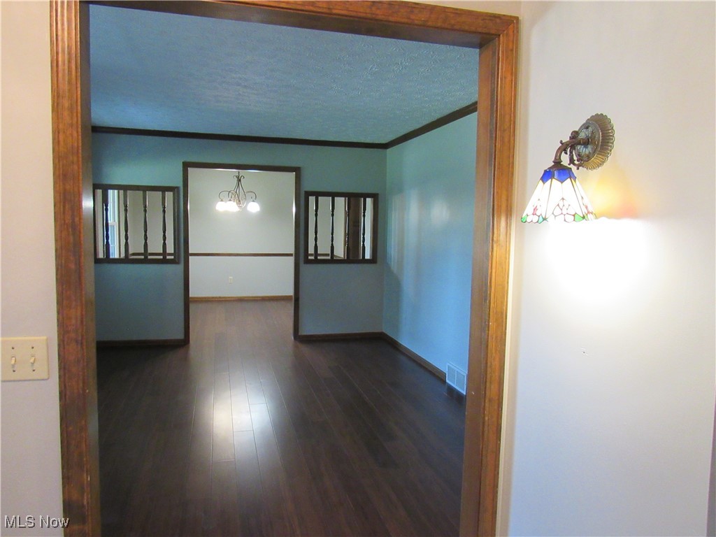 1120 Vincent Road Southeast North Canton, OH 44720 - Photo 9 of 50 View from Foyer through to Living Room and Formal Dining