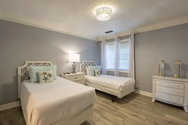 a bedroom with a bed and a walk in closet