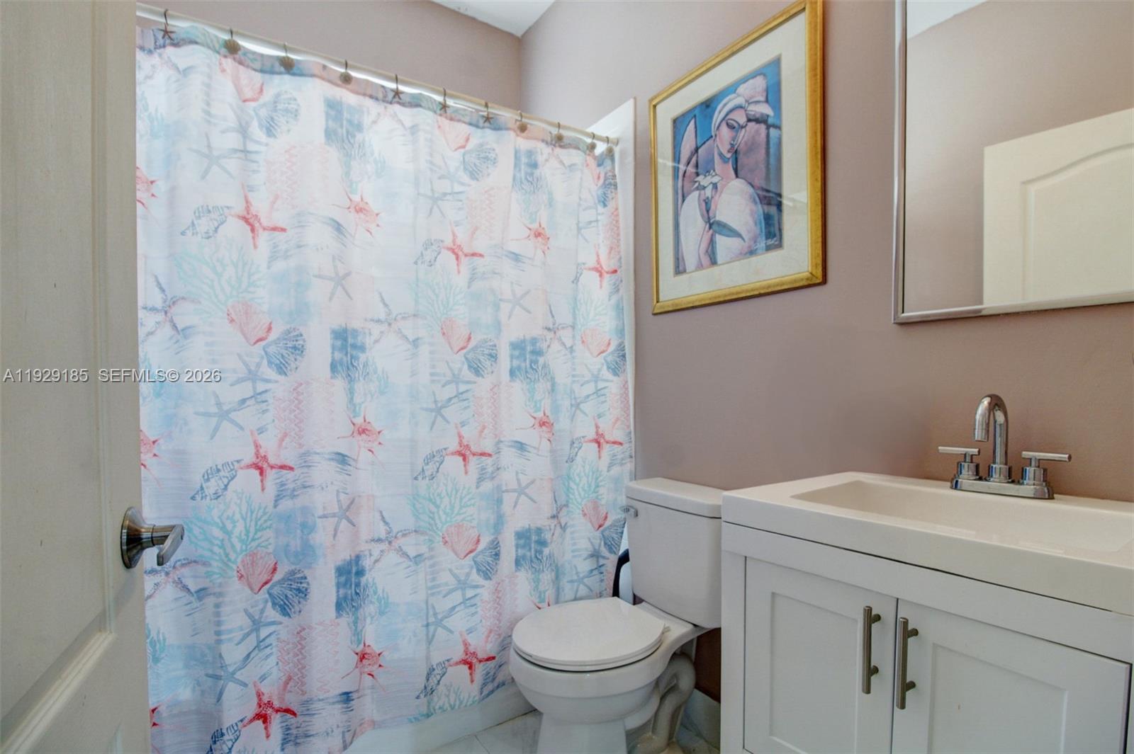 1156 Northeast 37th Place Homestead, FL 33033 - Photo 11 of 35 a bathroom with a sink toilet and a shower