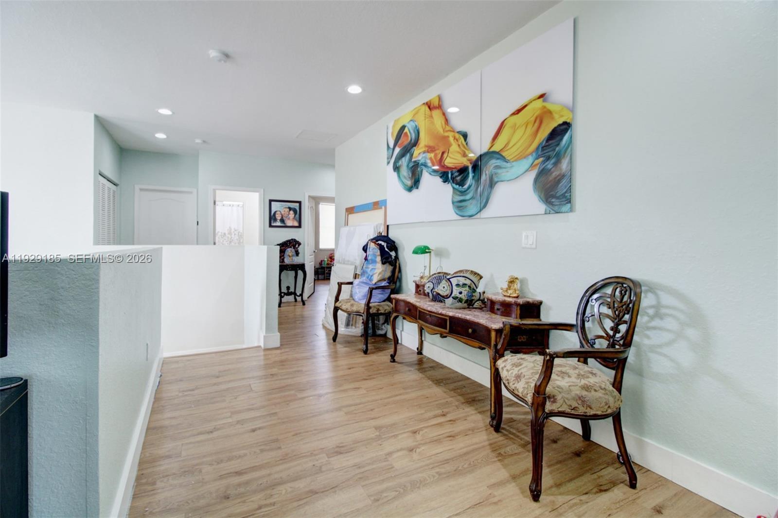 1156 Northeast 37th Place Homestead, FL 33033 - Photo 13 of 35 a living room with furniture and wooden floor
