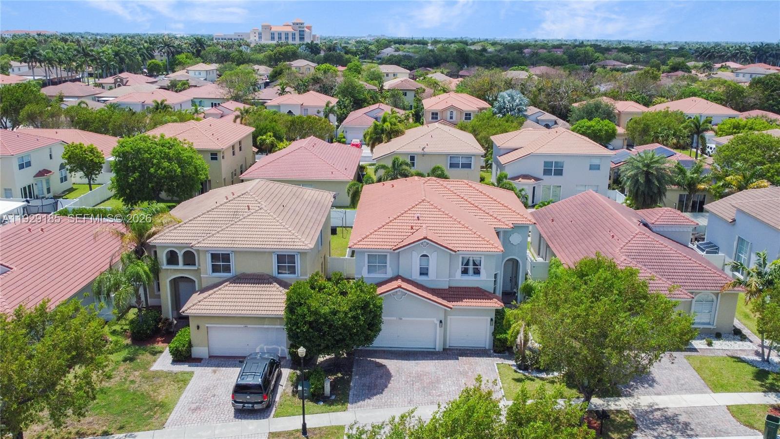 1156 Northeast 37th Place Homestead, FL 33033 - Photo 31 of 35 an aerial view of multiple houses with yard