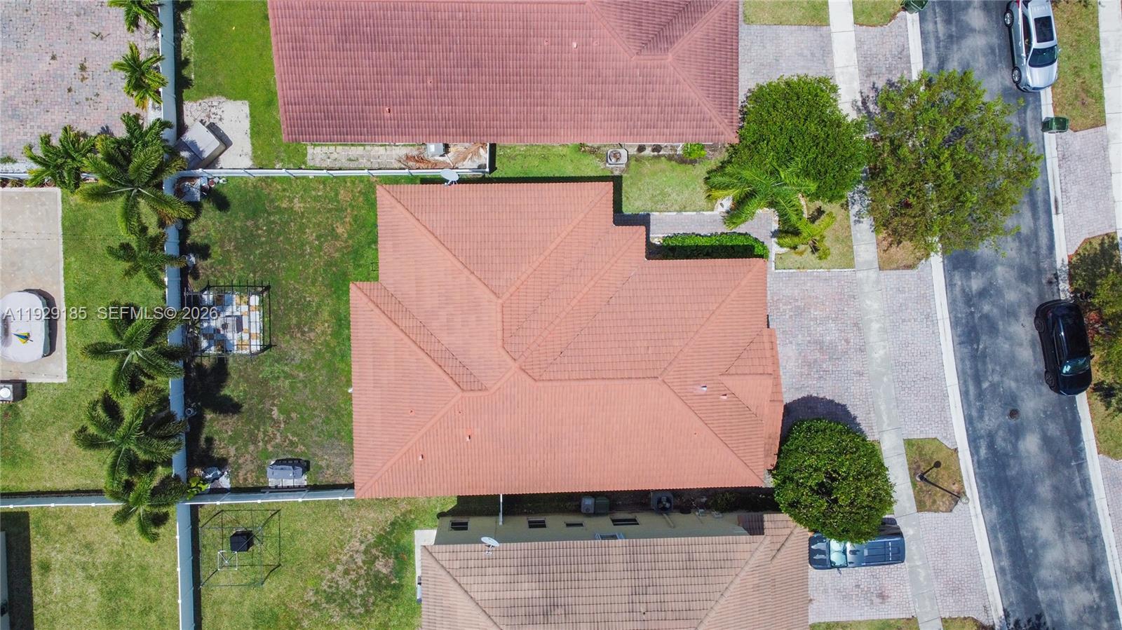 1156 Northeast 37th Place Homestead, FL 33033 - Photo 33 of 35 an aerial view of a house with a yard