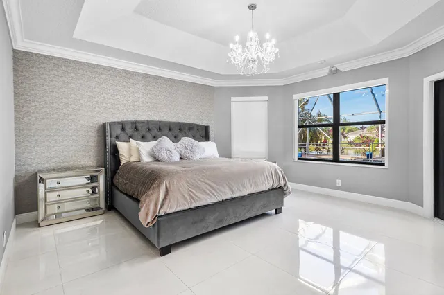 a spacious bathroom with a tub sink shower and mirror