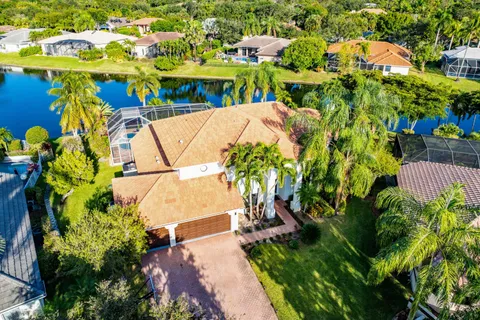 a view of swimming pool with a yard