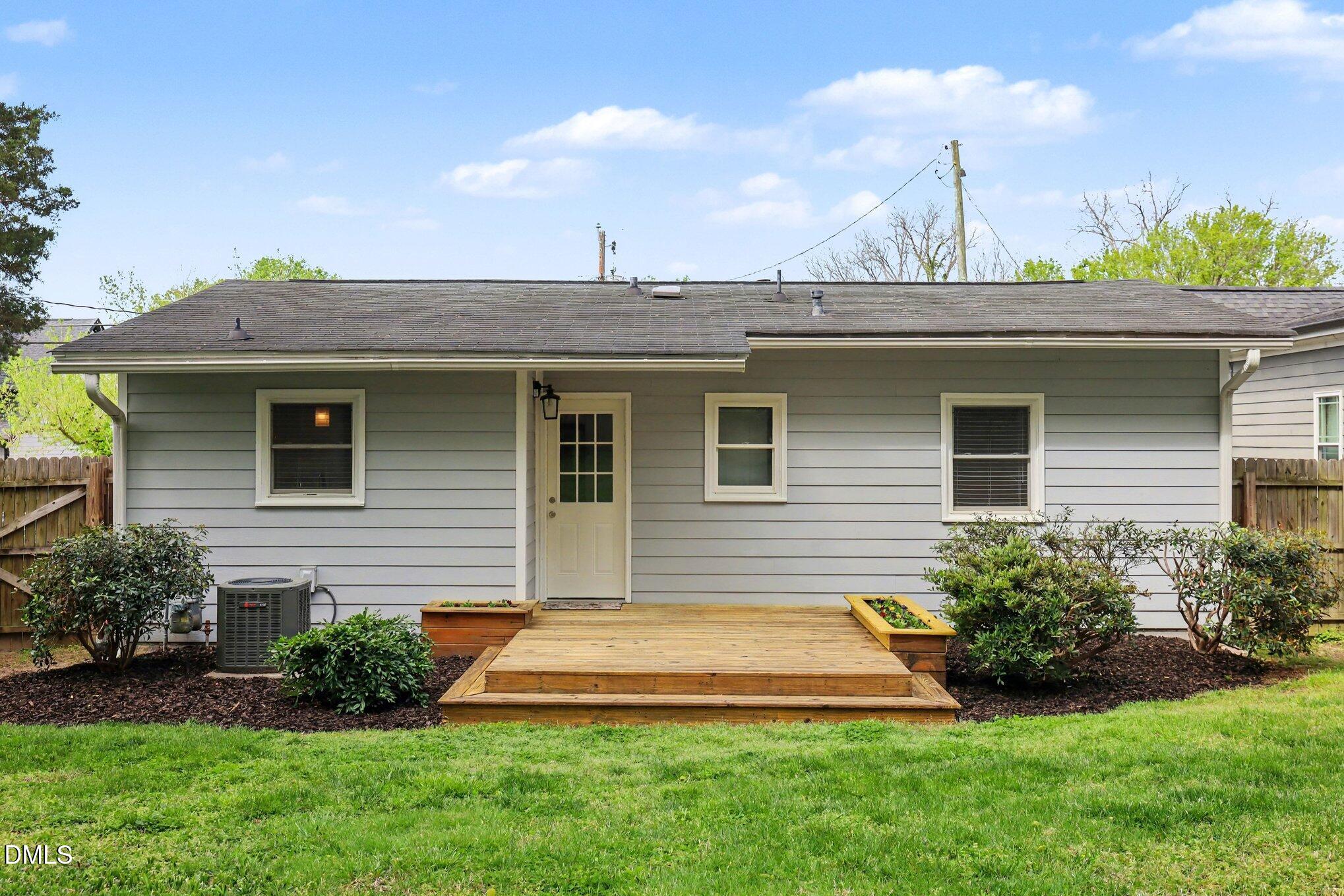 727 South State Street Raleigh, NC 27601 - Photo 22 of 30 a view of a house with a yard