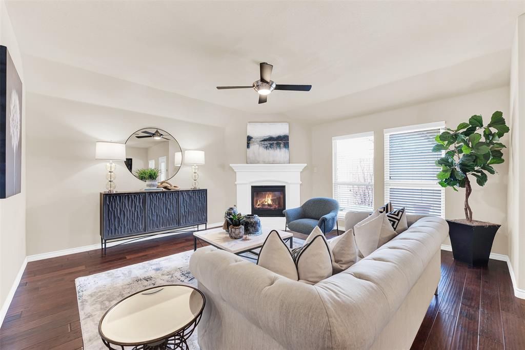 4813 Stacy Court Rowlett, TX 75088 - Photo 11 of 36 Gas fireplace in the cozy living area