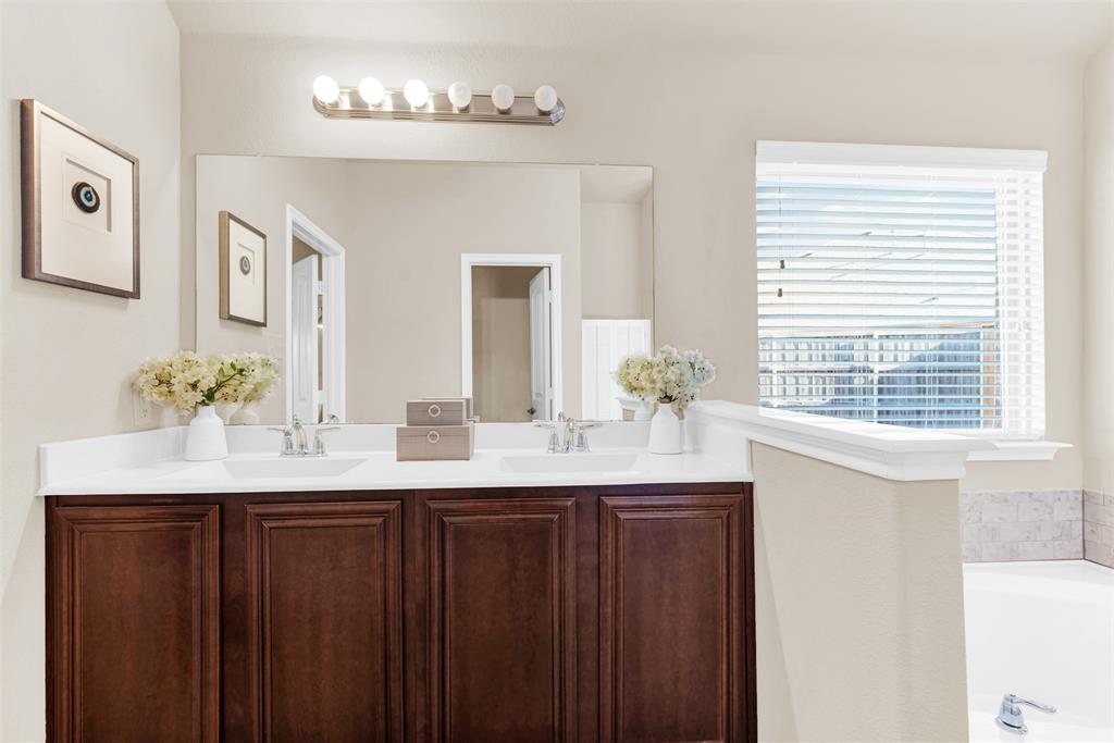 4813 Stacy Court Rowlett, TX 75088 - Photo 21 of 36 Double vanity in the primary bathroom