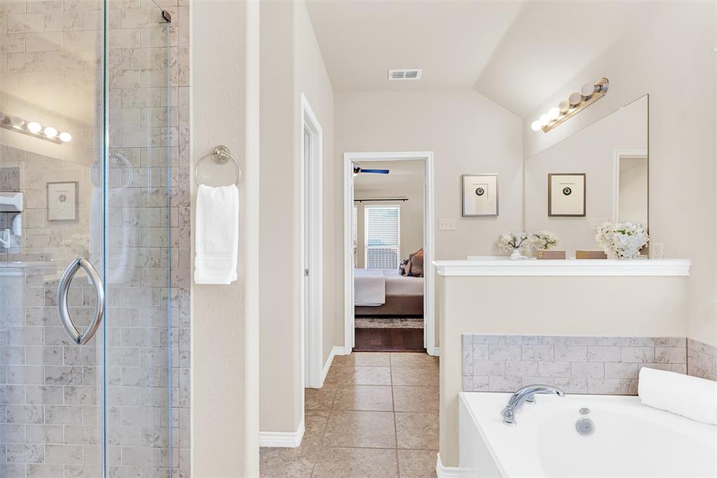4813 Stacy Court Rowlett, TX 75088 - Photo 22 of 36 Separate tub and shower in primary bathroom