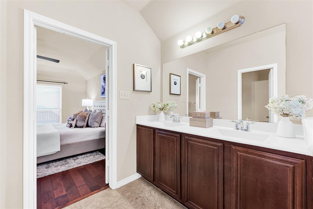 4813 Stacy Court Rowlett, TX 75088 - Photo 23 of 36 Primary bathroom looking out into the bedroom