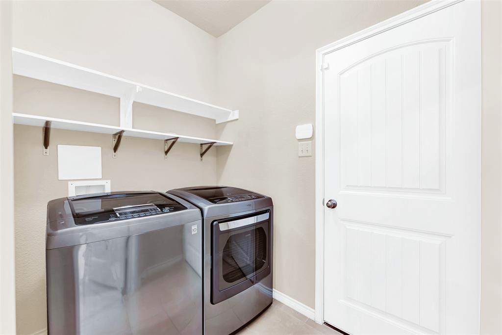 4813 Stacy Court Rowlett, TX 75088 - Photo 25 of 36 Laundry room off the kitchen with garage access