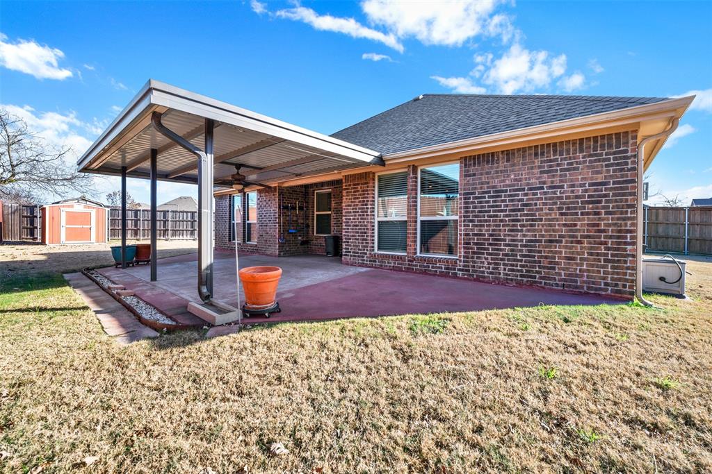 4813 Stacy Court Rowlett, TX 75088 - Photo 29 of 36 Extra large, covered, and extended back patio