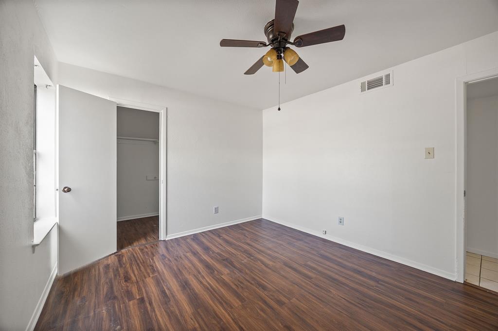 2736 Chebi Lane Denton, TX 76209 - Photo 19 of 27 wooden floor in an empty room with a window