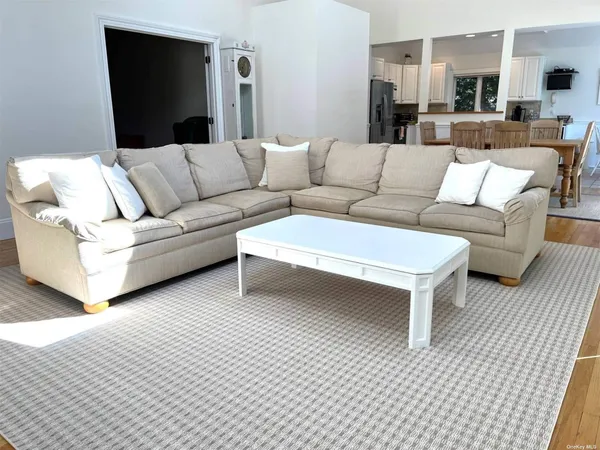 a living room with furniture and a couch