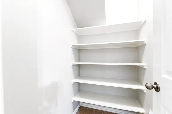 a view of room with rack on the wall