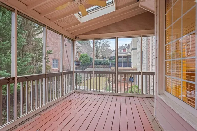 a view of a garden with a house